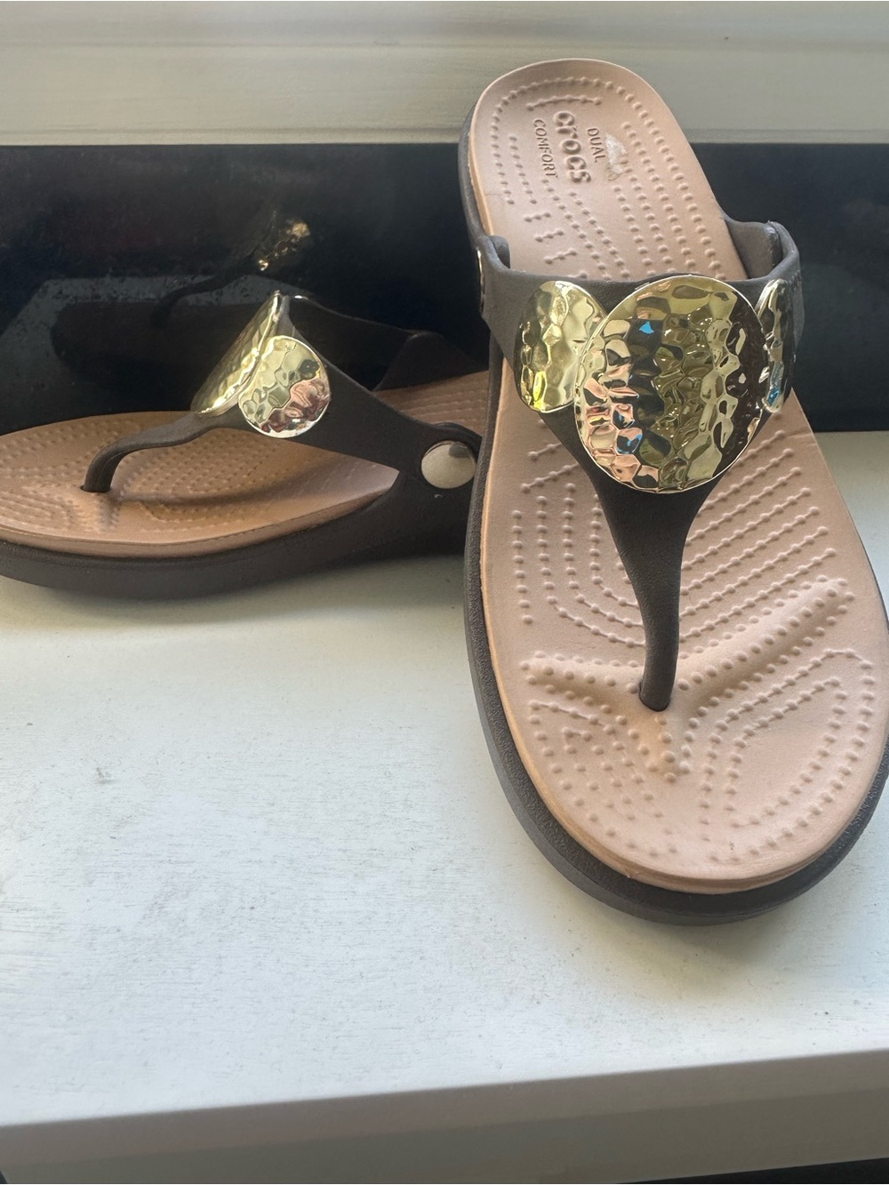 CROCS Brown and Gold Hammered Medallion Thong Sandals